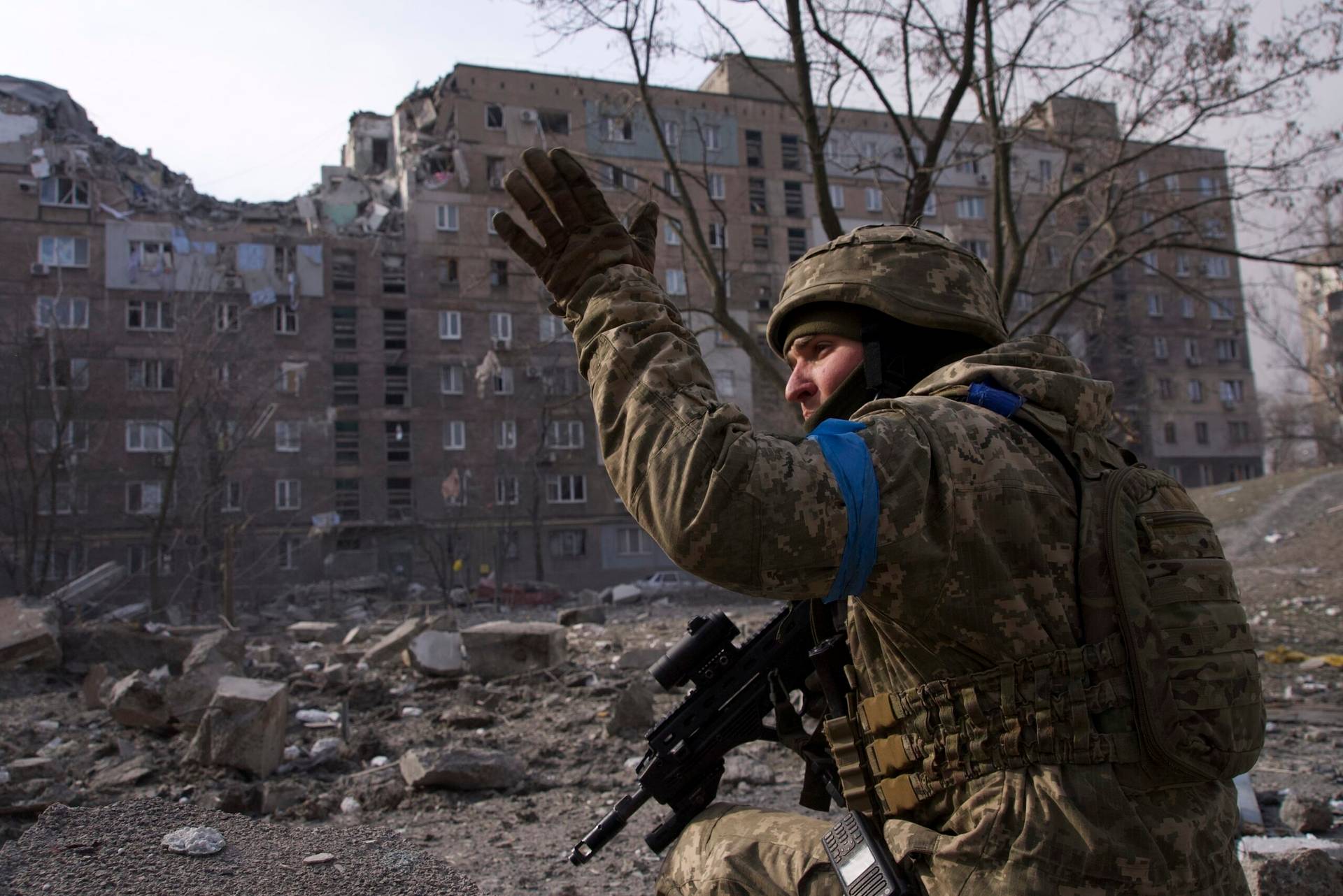 A Ukrainian serviceman guards his position in Mariupol, Ukraine, Saturday, March 12, 2022. (Credit: Mstyslav Chernov/AP.)