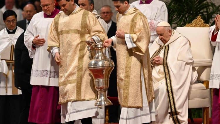 Servers carry an urn of sacred oil during Pope Francis's Chrism Mass in St. Peter's Basilica on April 6, 2023. (Credit: Vatican Media.)