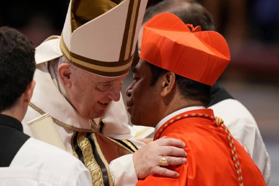 Pope Francis greets Cardinal Virgilio do Carmo da Silva, Archbishop of Dili, Timor-Leste, during the Aug. 27, 2022, consistory in Saint Peter's Basilica in whch Silva was elevated. (Credit: Vatican Media.)