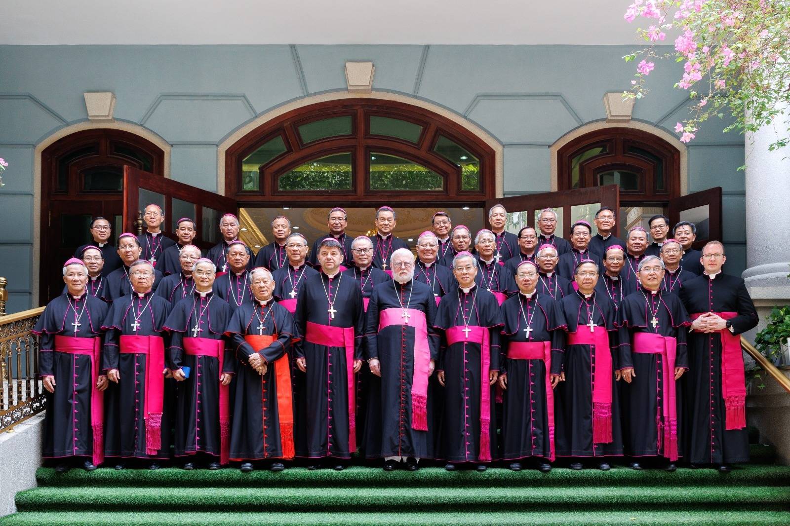 British Archbishop Paul Gallagher, Vatican Secretary for Relations with States (front center), poses for a photo with Vietnamese bishops during his April 9-14 visit to Vietnam. (Credit: Vatican Media.)