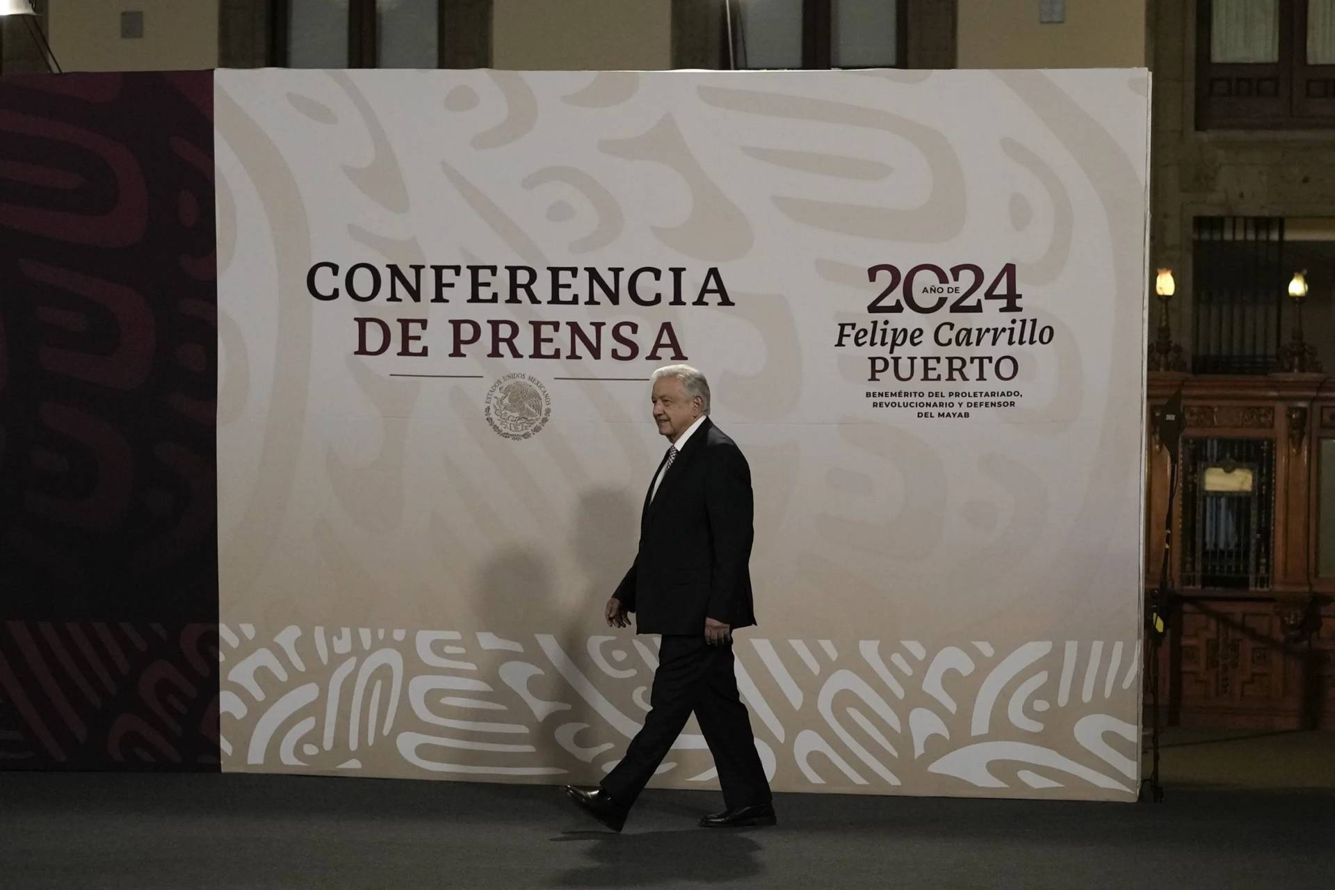 Mexican President Andres Manuel Lopez Obrador arrives to start his daily, morning press conference at the National Palace in Mexico City, March 1, 2024. Lopez Obrador commented on the country’s first presidential debate ahead of the June election, expressing anger on Tuesday, April 9, 2024, that debate moderators posed questions about corruption and problems with the education and healthcare systems, issues he says he has resolved. (Credit: Marco Ugarte/AP.)