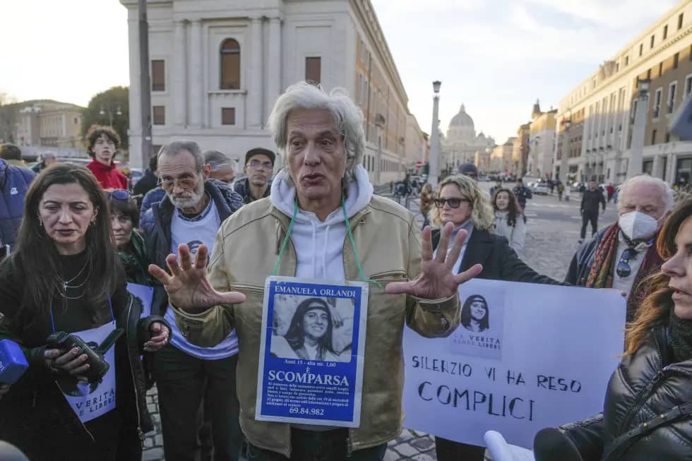 Pietro Orlandi wears a placard with a picture of his sister Emanuela during a sit-in near Saint Peter’s Basilica, in Rome, Saturday, Jan. 14, 2023. (Credit: Gregorio Borgia/AP.)