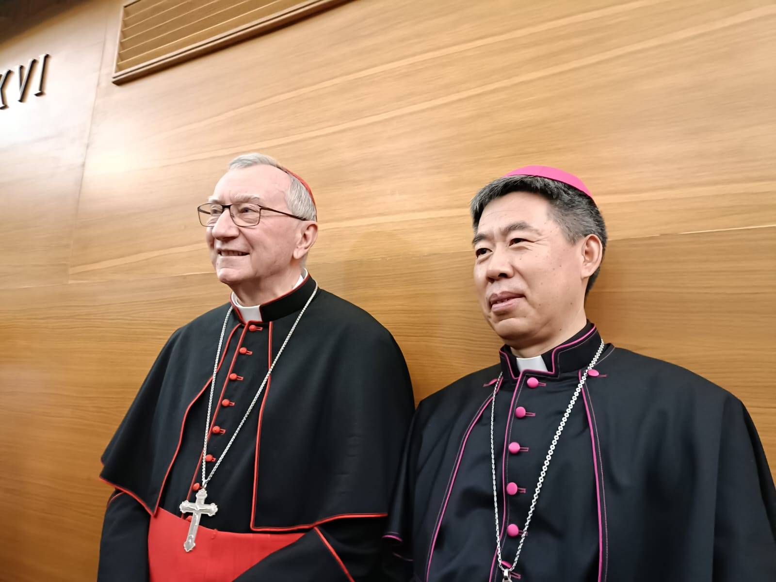Cardinal Pietro Parolin, left, poses for a photo with Bishop Joseph Shen Bin of Shanghai at a conference at the Pontifical Urban University in Rome on May 21, 2024. (Credit: Elise Ann Allen/Crux.)