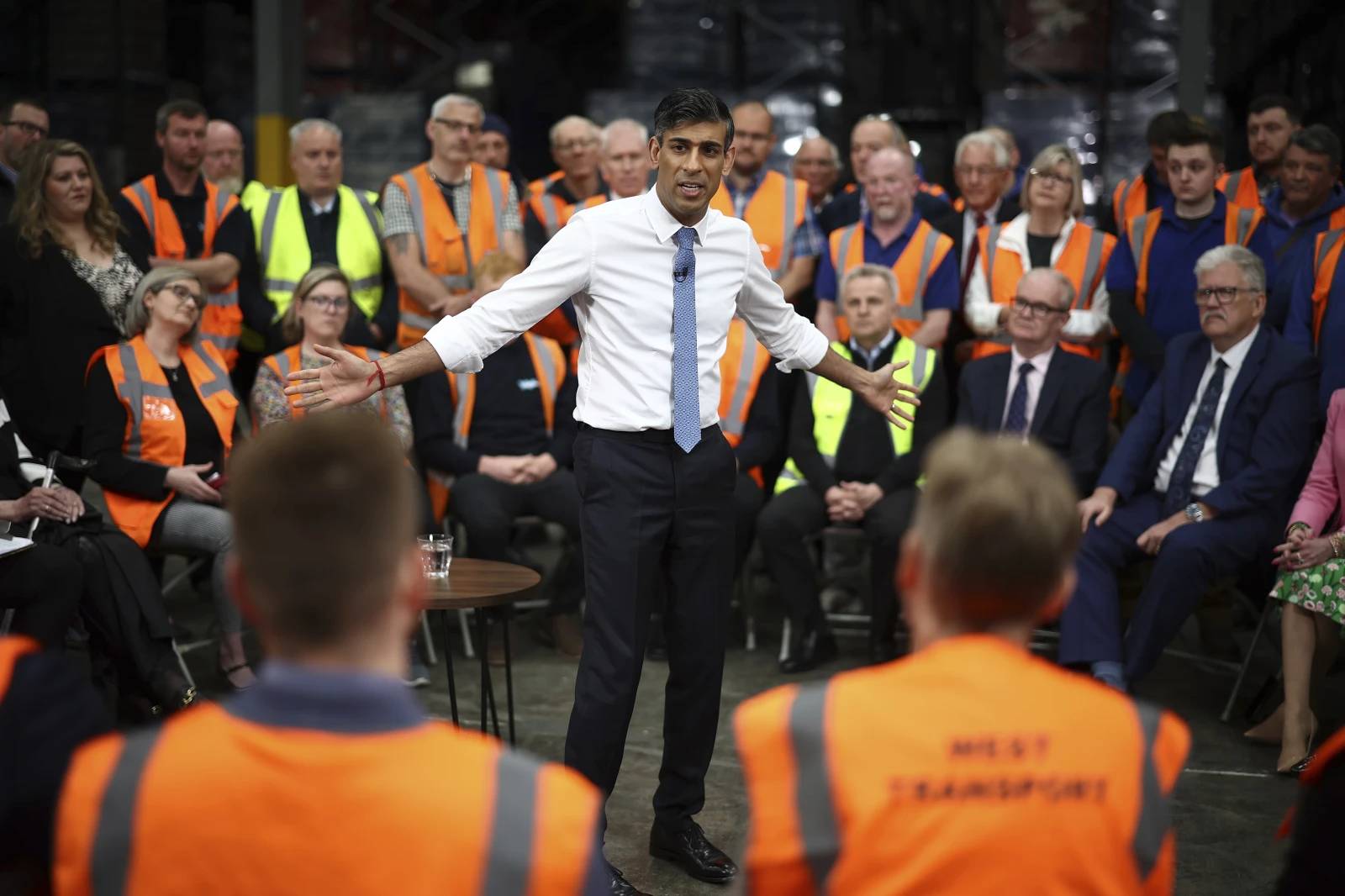 Britain’s Prime Minister and Conservative Party leader Rishi Sunak holds a Q&A with staff of a West William distribution centre in Ilkeston in the East Midlands, Britain, Thursday, May 23, 2024 as part of a campaign event ahead of a general election on July 4. (Henry Nicholls/Pool photo via AP.)