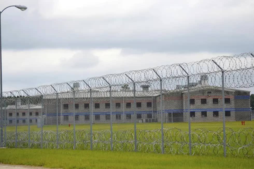 The perimeter of the Diboll Correctional Facility is seen on July 19, 2014, in Diboll, Texas. (Credit: Rhonda Oaks/The Daily News via AP.)
