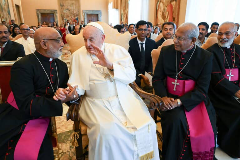 Pope Francis shakes hands with Indian Archbishop Raphael Thattil, the major archbishop of Ernakulam-Angamaly, during a meeting with bishops, priests and faithful from the Syro-Malabar Catholic Church at the Vatican May 13, 2024. (Credit: CNS photo/Vatican Media.)