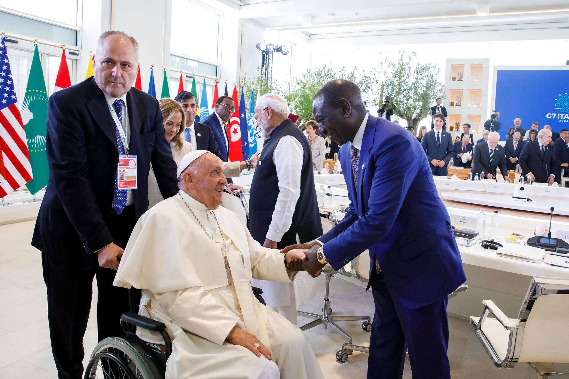 Kenyan President William Ruto greets Pope Francis at the G7 summit in Apulia, Italy, on June 15, 2024. (Credit: Republic of Kenya.)