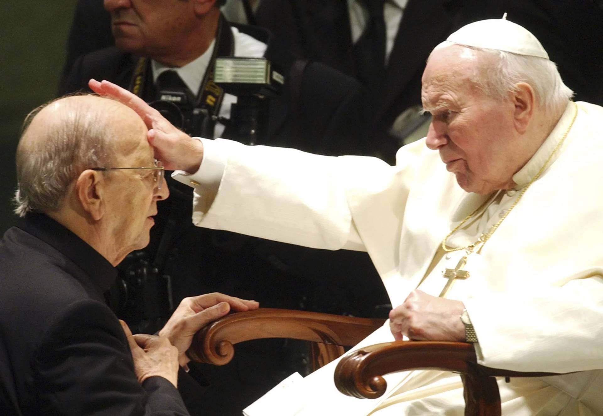 Pope John Paul II gives his blessing to late father Marcial Maciel, founder of Christ’s Legionaries, during a special audience the pontiff granted to about four thousand participants of the Regnum Christi movement, at the Vatican, on Nov. 30, 2004. The recently-opened archives of Pope Pius XII have shed new light on claims the World War II-era pope didn’t speak out about the Holocaust. But they’re also providing details about another contentious chapter in Vatican history: the scandal over the founder of the Legionaries of Christ. (Credit: Plinio Lepri/AP.)