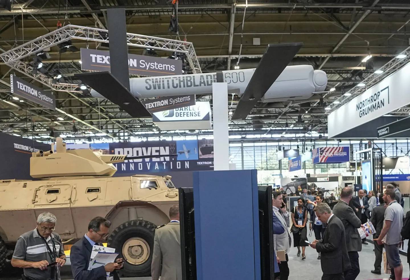 An autonomous missile drone is displayed during a 2022 arms show. (Credit: Michael Euler/AP.)