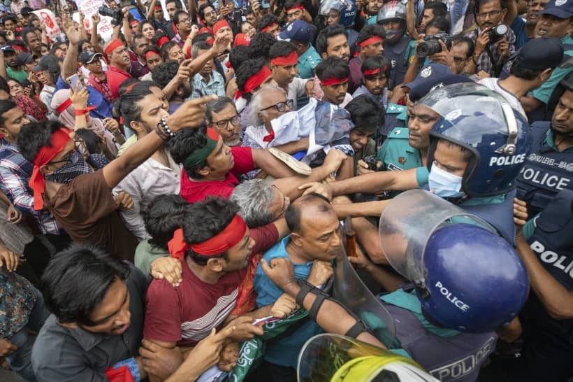 Activists clash with the police as they stage a song march to remember victims of the recent countrywide deadly clashes, in Dhaka, Bangladesh, Tuesday, July 30, 2024. (Credit: Rajib Dhar/AP.)