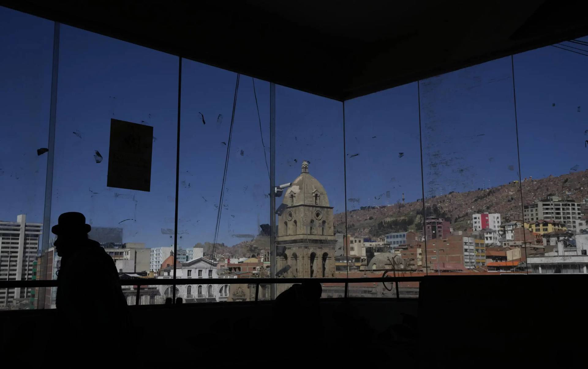 The Basilica of San Francisco is seen from inside a food market, in La Paz, Bolivia, Friday, May 26, 2023. (Credit: Juan Karita/AP.)