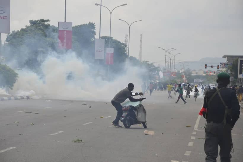 Police fired tear gas during a protest in Abuja, Nigeria, Thursday, Aug. 1, 2024. (Credit: Olamikan Gbemiga/AP.)