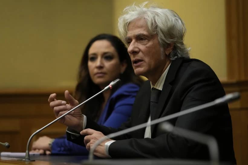 Pietro Orlandi, right, brother of Manuela, a 15-year-old daughter of a Vatican employee disappeared in 1983, is flanked by his lawyer Laura Sgro, left, as he attends a press conference on the establishing of a parliamentary investigative commission on Manuela Orlandi and other cold cases, in Rome, on Dec. 20, 2022. (Credit: Alessandra Tarantino/AP.)