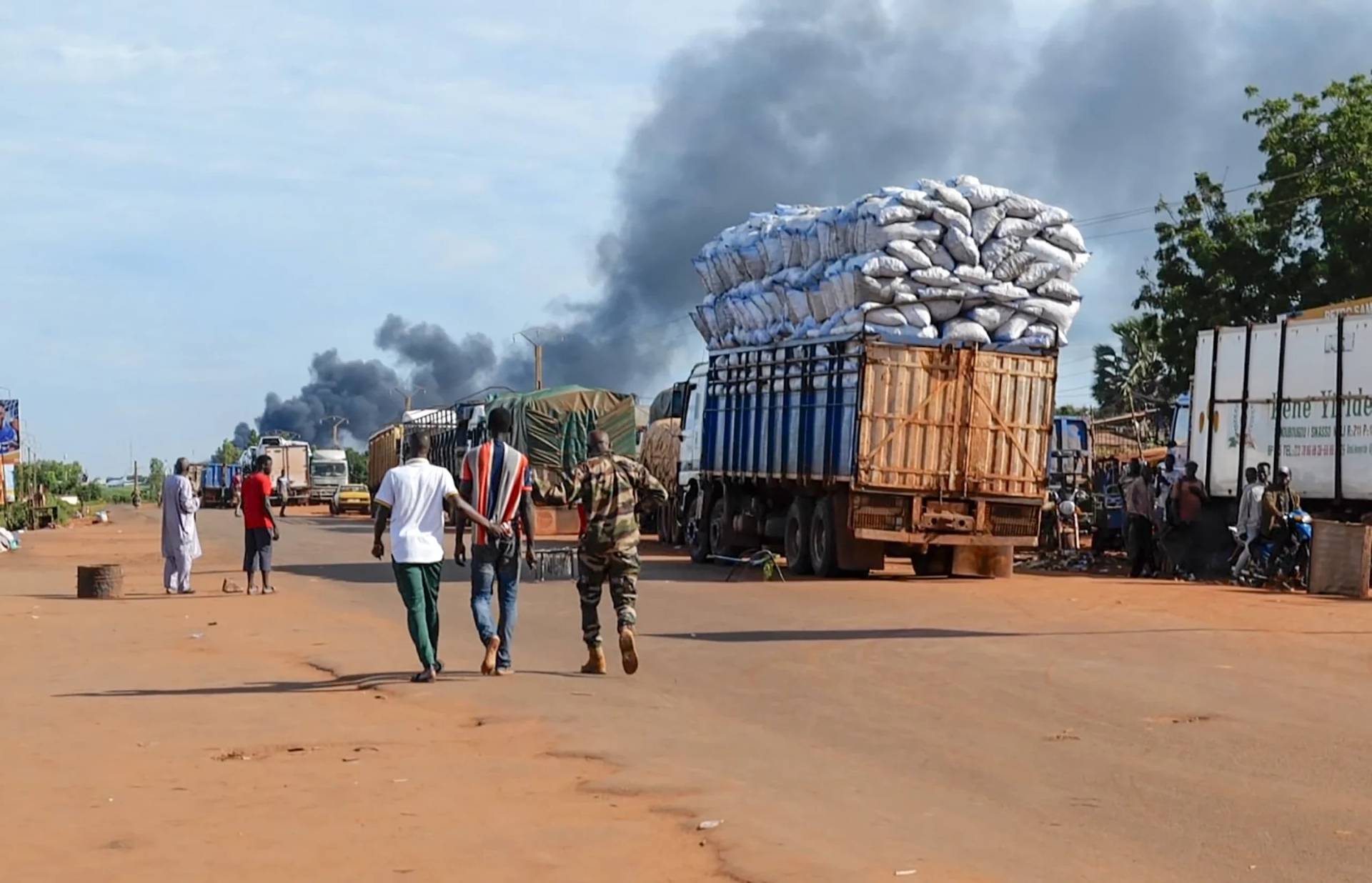 This video grab shows Malian security personnel detaining a man after Mali’s army said a military training camp in the capital Bamako has been attacked early Tuesday, Sept. 17 2024. (Credit: AP Photo.)