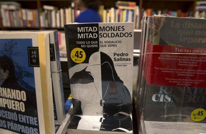 In this Oct. 31, 2015 file photo, the book “Half Monks, Half Soldiers” stands for sale at a bookstore in Lima, Peru. (Credit: Martin Mejia./AP.)