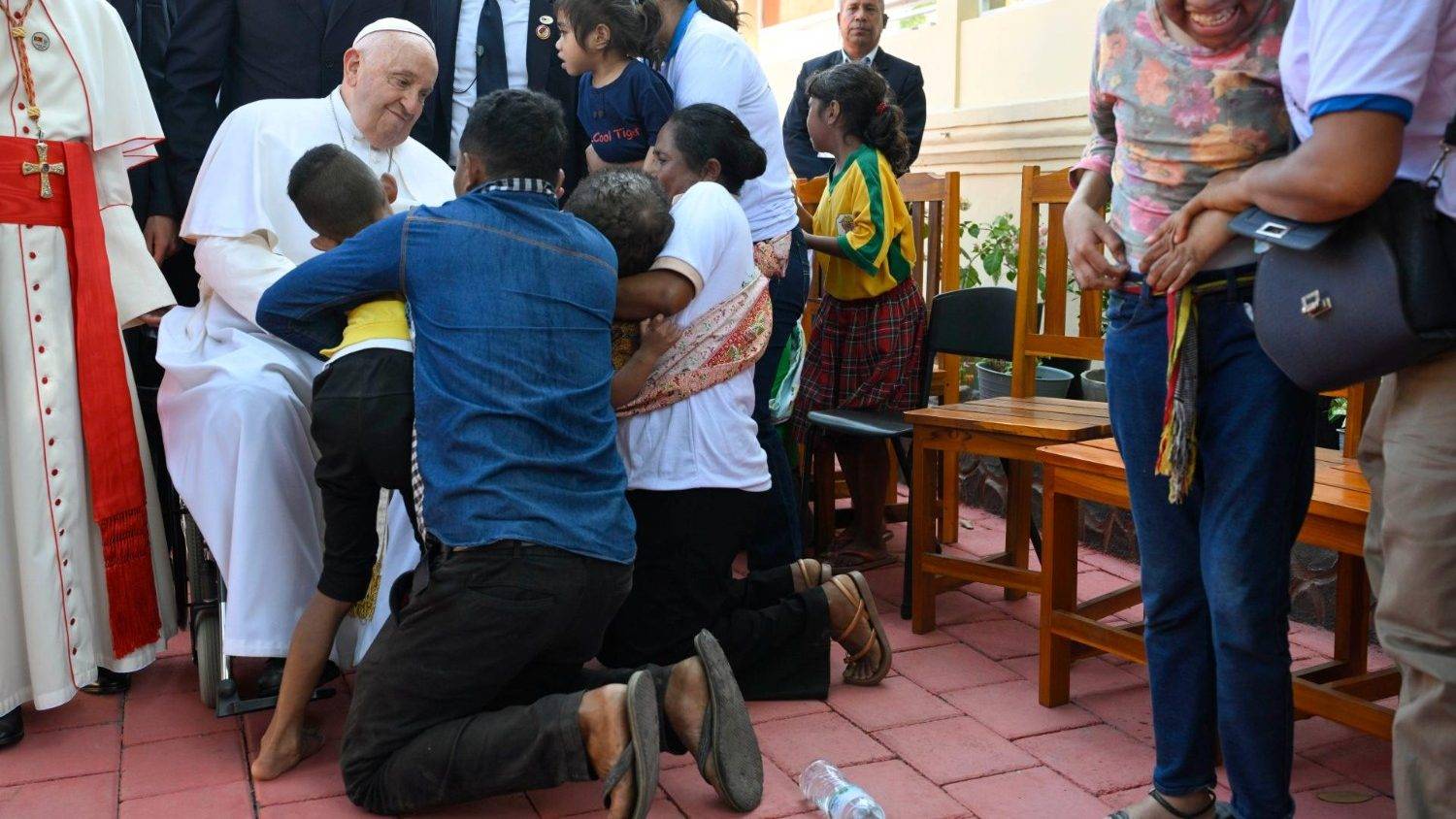 Pope Francis embraces a family in tears during a meeting with children with disabilities at the Irmãs Alma school in Dili on Sept. 10, 2024. (Credit: Vatican Media.)