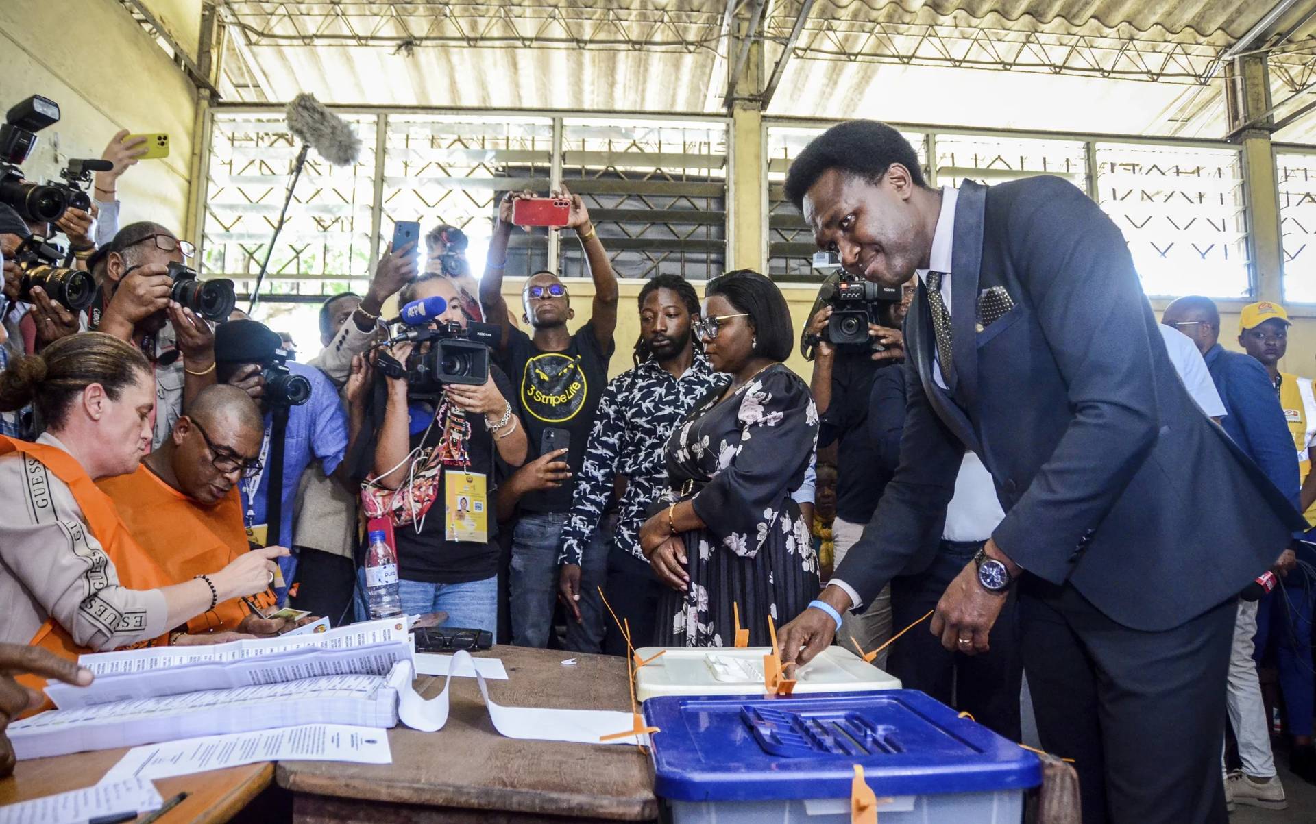 Independent candidate Venancio Mondlane, right, casts his vote in general elections in Maputo, Mozambique, Wednesday, Oct. 9, 2024. (Credit: Carlos Equeio/AP.)