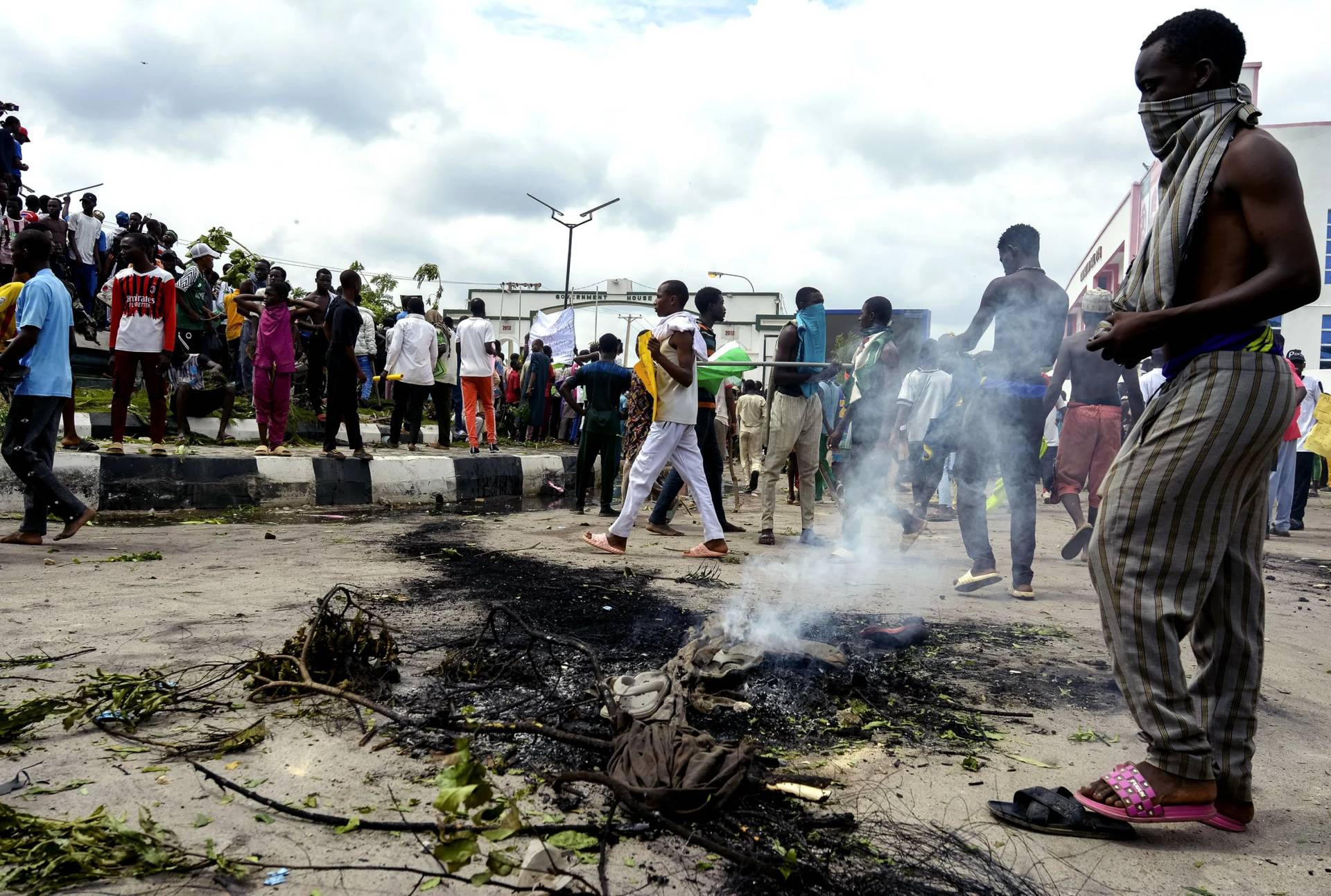 People protest on the street of Kano, Nigeria, Thursday, Aug. 1, 2024. Nigeria’s leader on Sunday, Aug. 4, called for an end to mass protests against the West African nation’s economic hardship, saying the rallies have turned violent and have become politically motivated.(Credit: Sani Maikatanga/AP.)