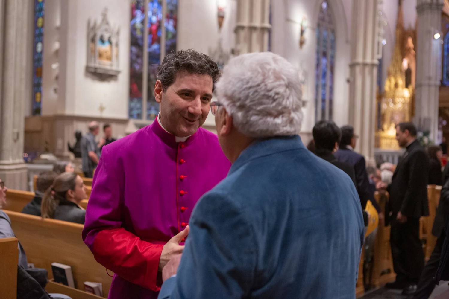 Cardinal-elect Francis Leo speaking with a parishioner at his Mass of Installation to the Archdiocese of Toronto in March, 2023. (Credit: Archdiocese of Toronto.)