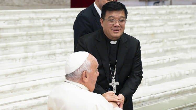 Bishop Joseph Yang Yongqiang of Hangzhou shakes hands with Pope Francis during the October 2024 Synod of Bishops on Synodality at the Vatican. (Credit: Vatican Media.)