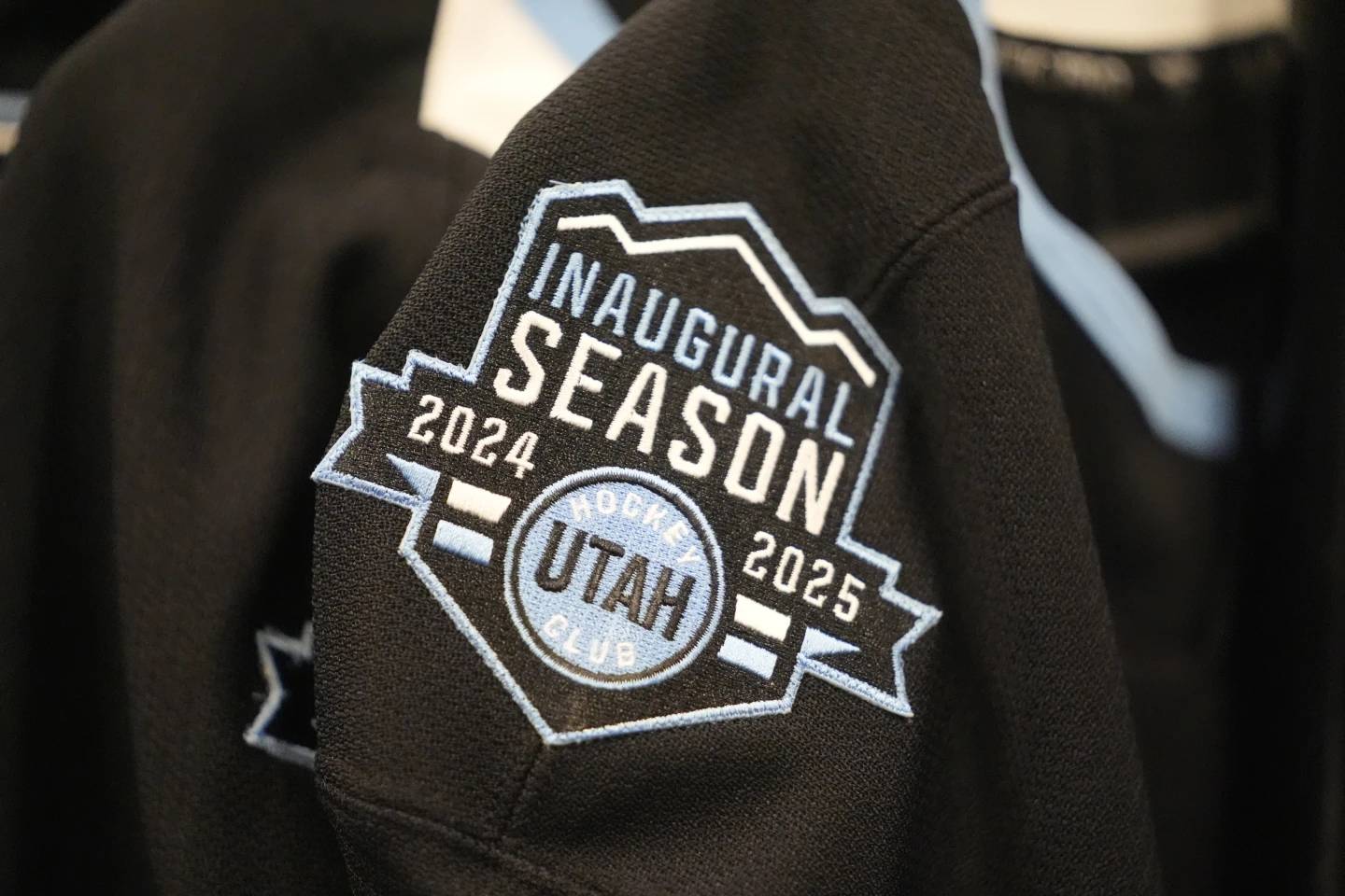 Utah Hockey Club jersey is shown during a tour of the new temporary practice facility locker room at the Olympic Oval Tuesday, Sept. 17, 2024, in Kearns, Utah. (Credit: Rick Bowmer/AP.)