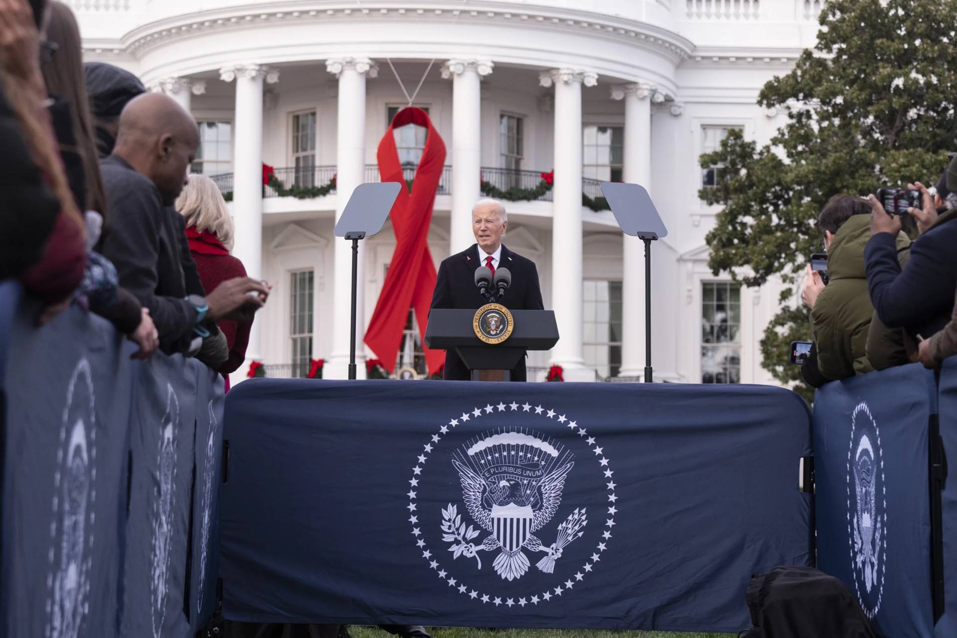 U.S. President Joe Biden speaks on the South Lawn of the White House during a ceremony to commemorate World AIDS Day with survivors, their families and advocates, Sunday, Dec. 1, 2024, in Washington. (Credit: Manuel Balce Ceneta/AP.)