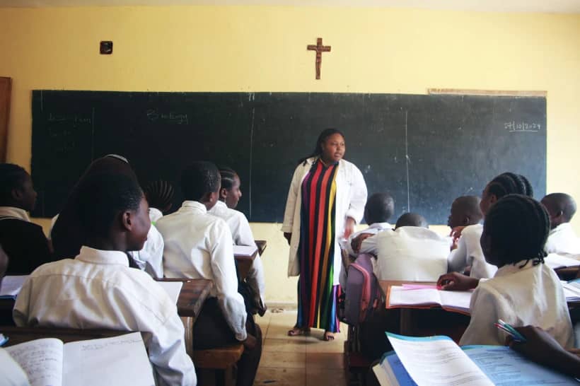 Students listen to the teacher in the Holy Infant high school, in Yaounde, Cameron, Monday, Oct. 7, 2024. (Credit: Angel Ngwe/AP.)