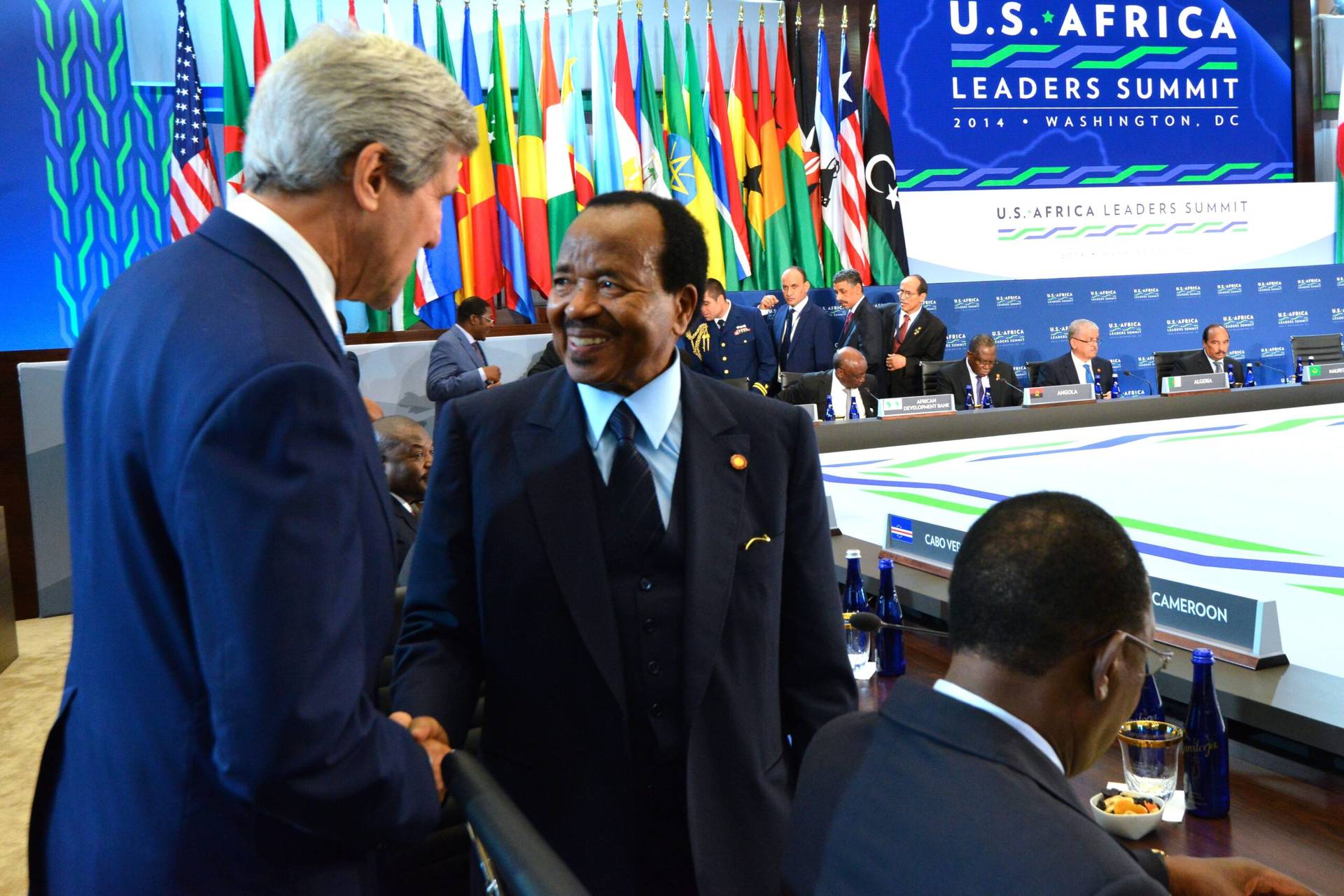 U.S. Secretary of State John Kerry greets President Paul Biya in 2014. (Credit: U.S. Secretary of State.)