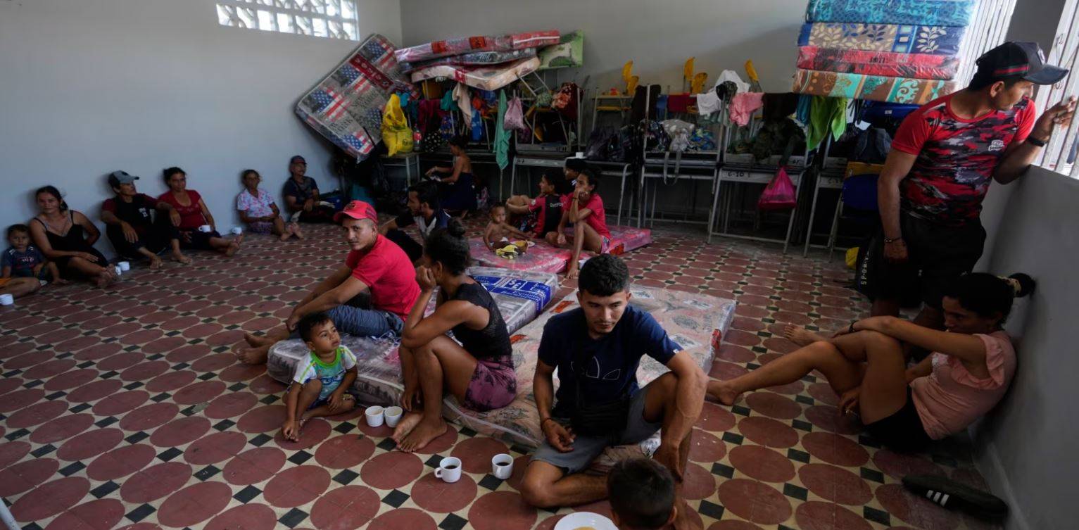 People displaced by violence in the Catatumbo region, where rebels of the National Liberation Army have been clashing with former members of the Revolutionary Armed Forces of Colombia, take shelter at a school in Tibu, Colombia, Jan. 20, 2025. (Credit: Associated Press.)