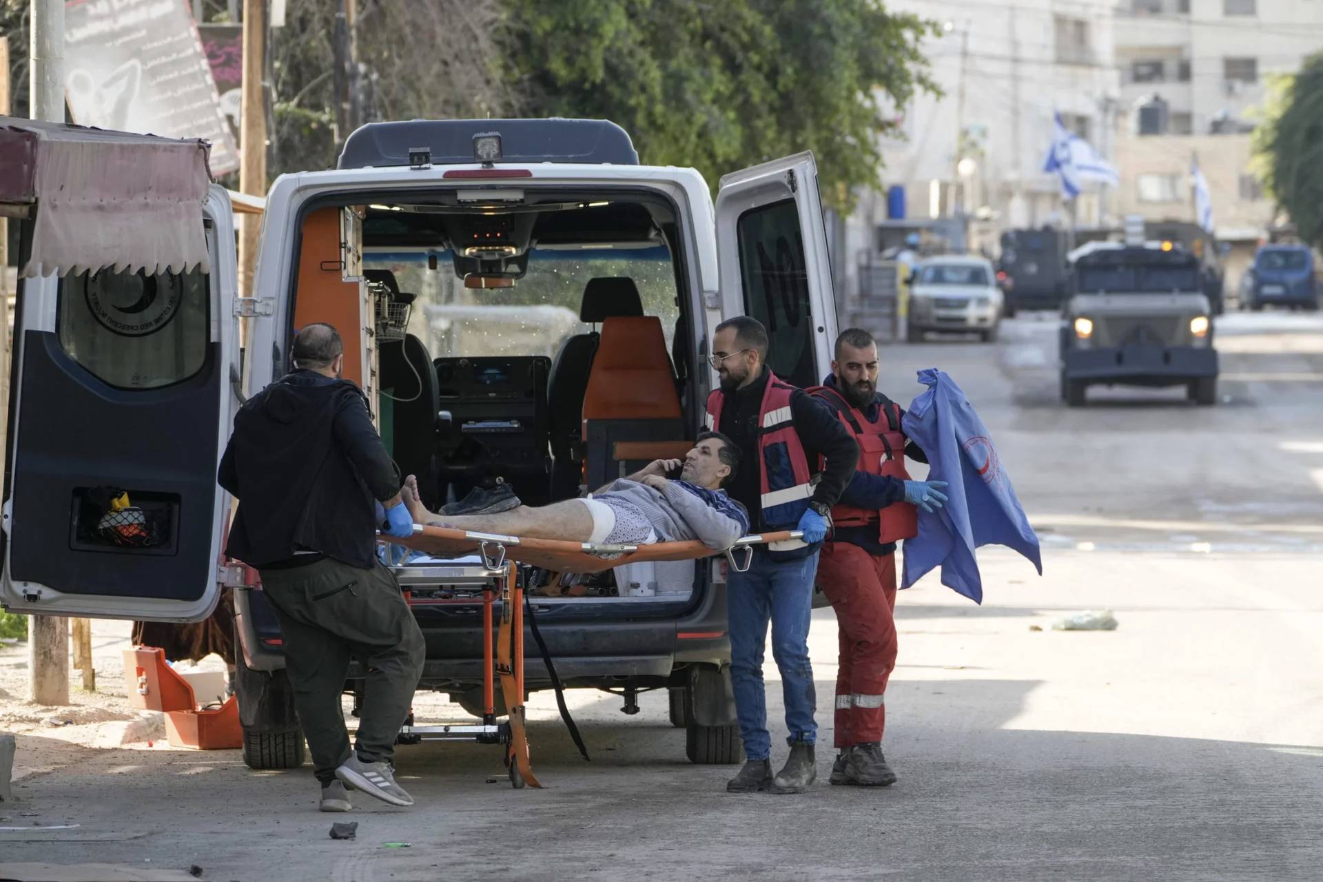 Medics evacuate a wounded man during an Israeli military operation in the West Bank city of Jenin, on Jan. 21, 2025. (Credit: Majdi Mohammed/AP.)