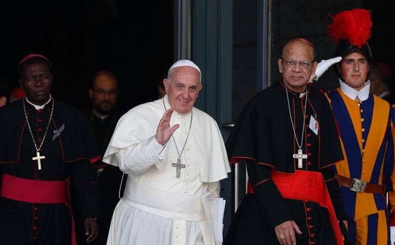 In a file photo, Pope Francis walks next to Indian Cardinal Oswald Gracias as he leaves the morning session of the extraordinary Synod of Bishops on the family at the Vatican Oct. 9, 2014. (Credit: Paul Haring/CNS.)