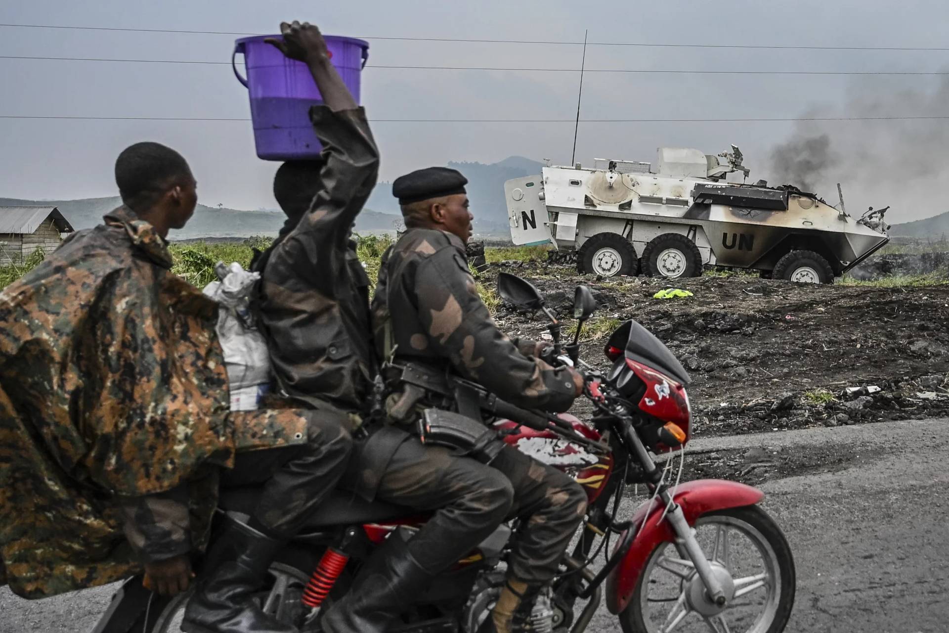 A UN armored personnel carrier burns during clashes with M23 rebels outside Goma, Democratic Republic of the Congo, Saturday, Jan. 25, 2025. (Credit: Moses Sawasawa/AP.)