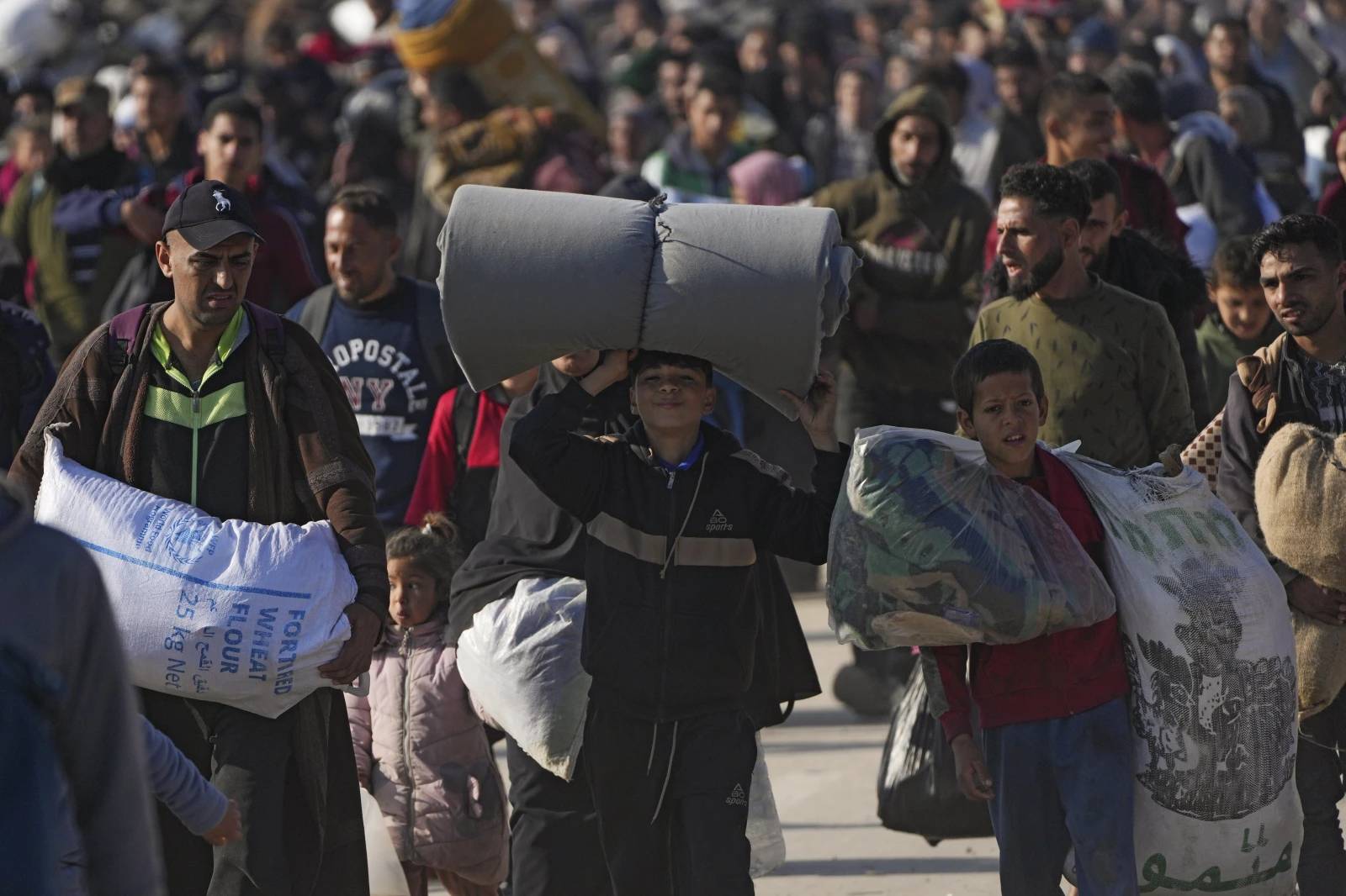 Displaced Palestinians return to their homes in the northern Gaza Strip, following Israel’s decision to allow thousands of them to go back for the first time since the early weeks of the 15-month war with Hamas, Monday, Jan. 27, 2025. (Credit: Abdel Kareem Hana/AP.)