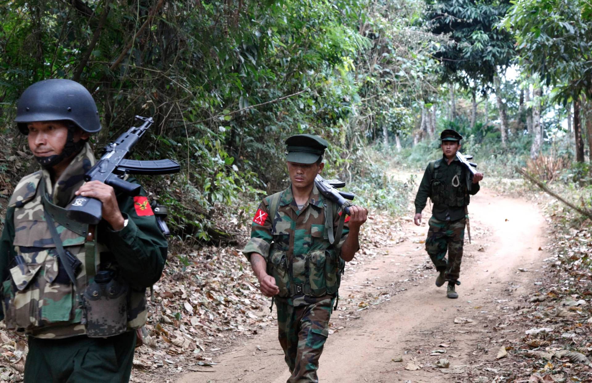 Kachin Independence Army fighters walk in a jungle path from Mu Du front line to Hpalap outpost in an area controlled by the Kachin rebels in northern Kachin state, Myanmar, March 17, 2018. (Credit: Esther Htusan/AP.)