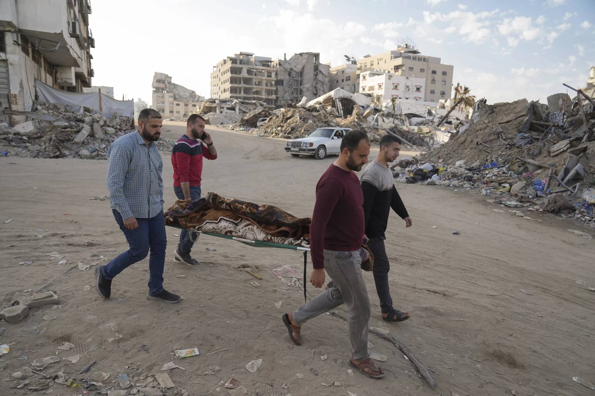 A body is brought to the hospital in the Gaza Strip on March 18, 2025. (Credit: Abdel Kareem Hana/AP.)