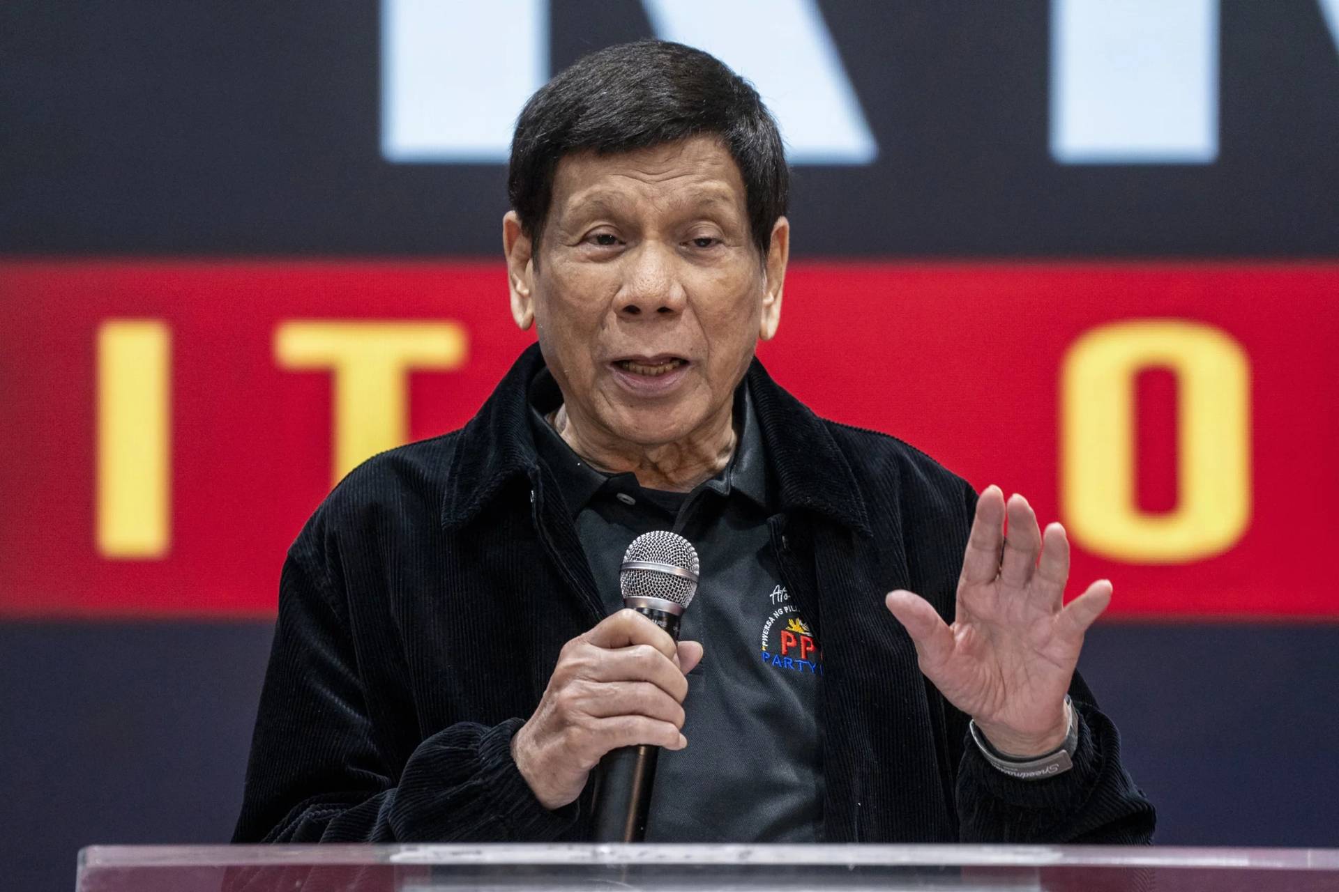 Former President of the Philippines Rodrigo Duterte speaks inside the Southorn Stadium during a thanksgiving gathering organized by Hong Kong-based Filipino workers for the former populist president in Hong Kong on Sunday, March 9, 2025. (Credit: Vernon Yuen/AP.)