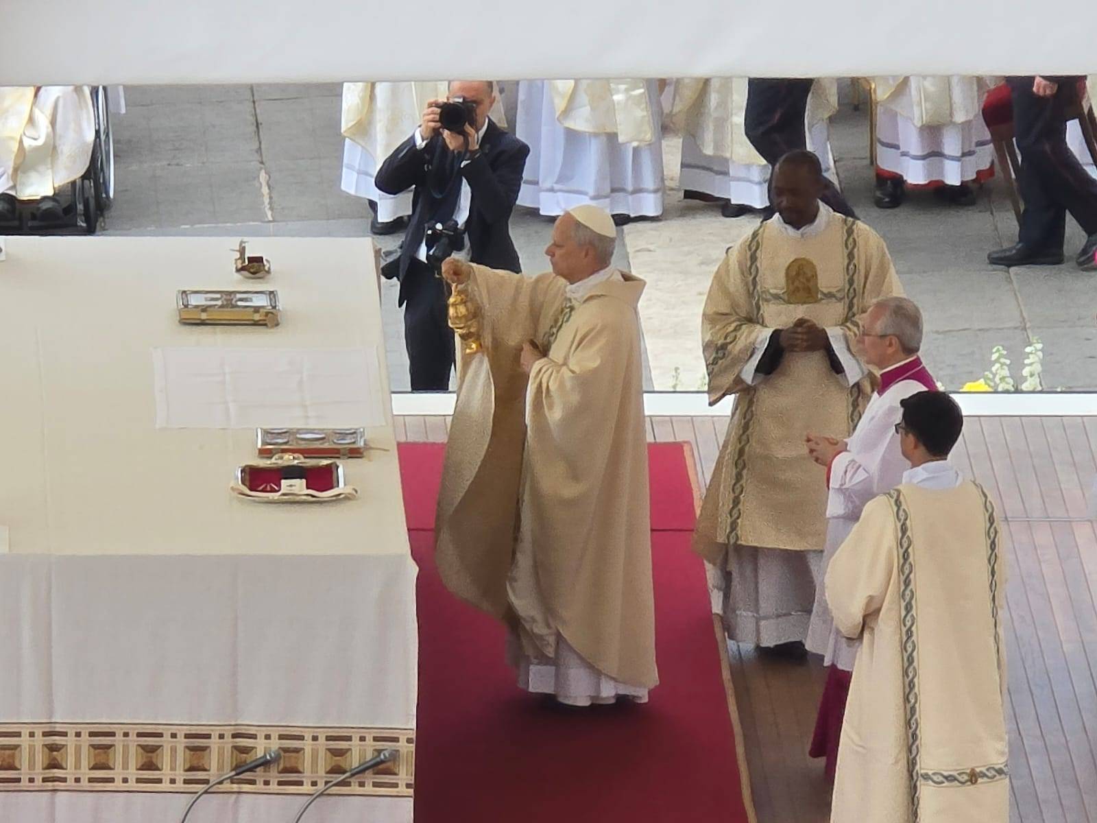 Pope Leo XIV blesses the altar before Mass at St. Peter's Square at the Vatican on May 18, 2025. (Credit: Elise Ann Allen/Crux.)