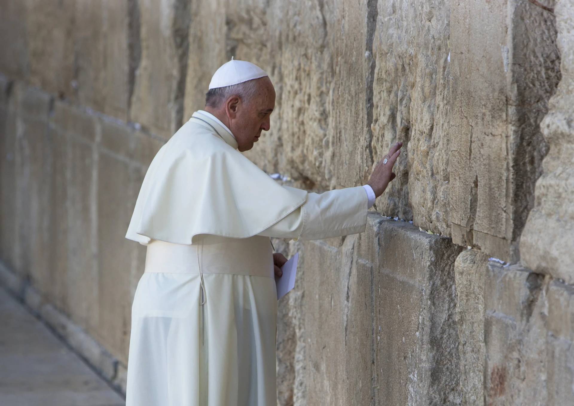 Pope Francis Prays in front of the Western Wall in Jerusalem on May 26, 2014. (Credit: Oded Balilty/AP.)