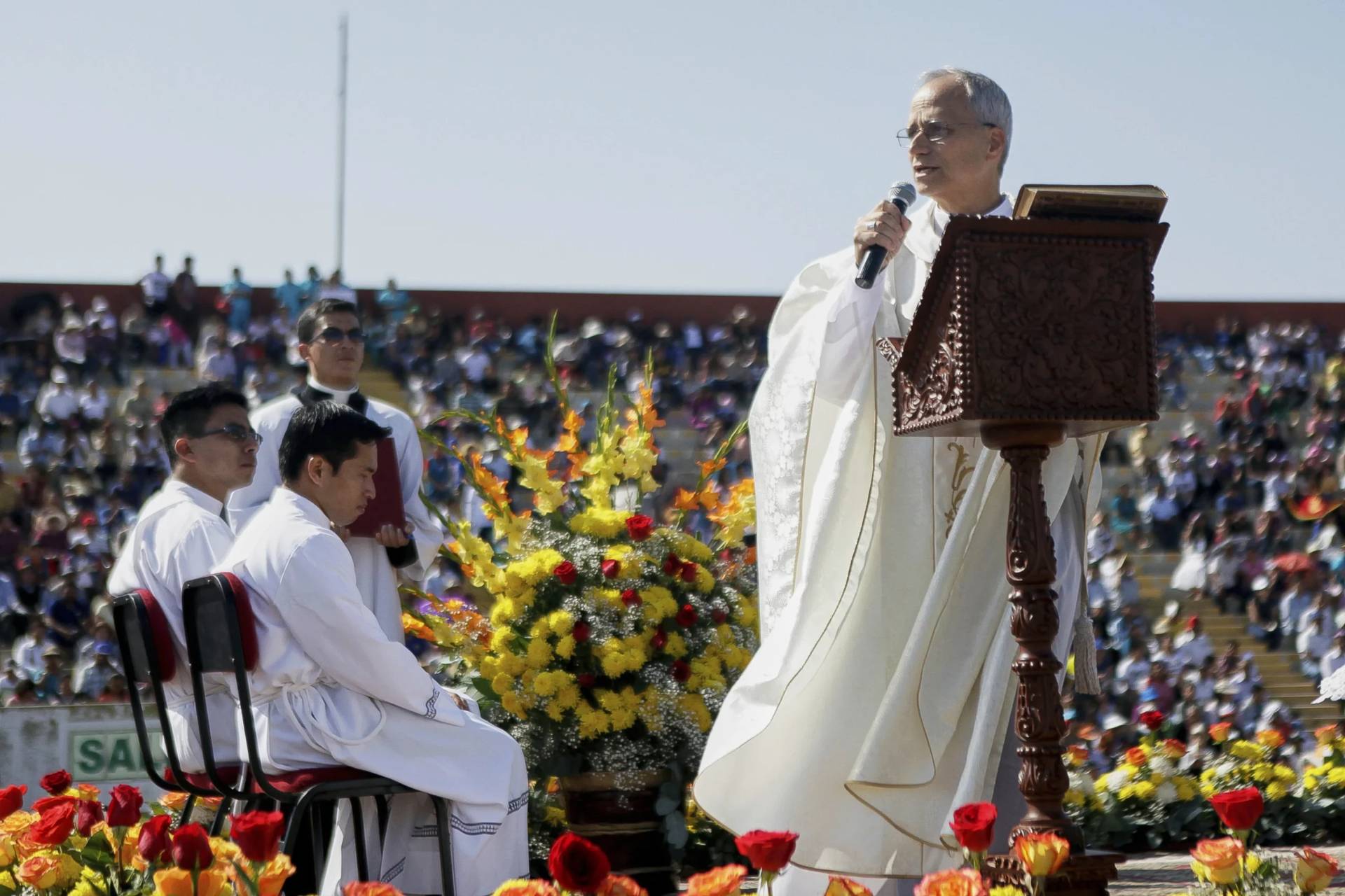 Pope Leo XIV, the Apostolic Administrator of Chiclayo, Bishop Robert Prevost, preaches during a Corpus Christi Mass in a stadium in Chiclayo, Peru, on June 19, 2019. (Credit: Julio Reano/AP.)