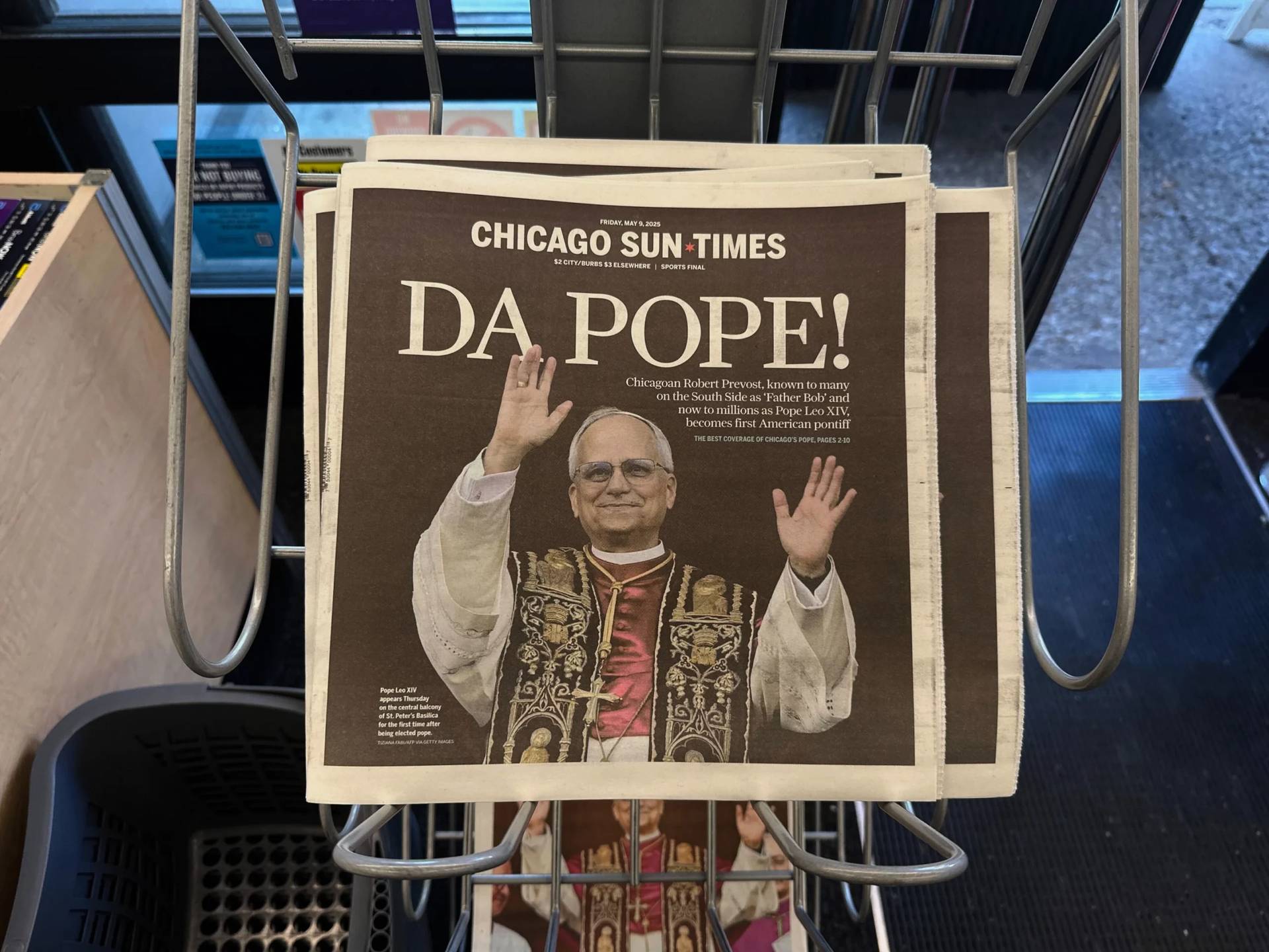 Chicago Sun Times newspaper headlines after Chicago native Cardinal Robert Francis Prevost becomes Pope Leo XIV, published on May 9, 2025. (Credit: Melina Walling/AP.)