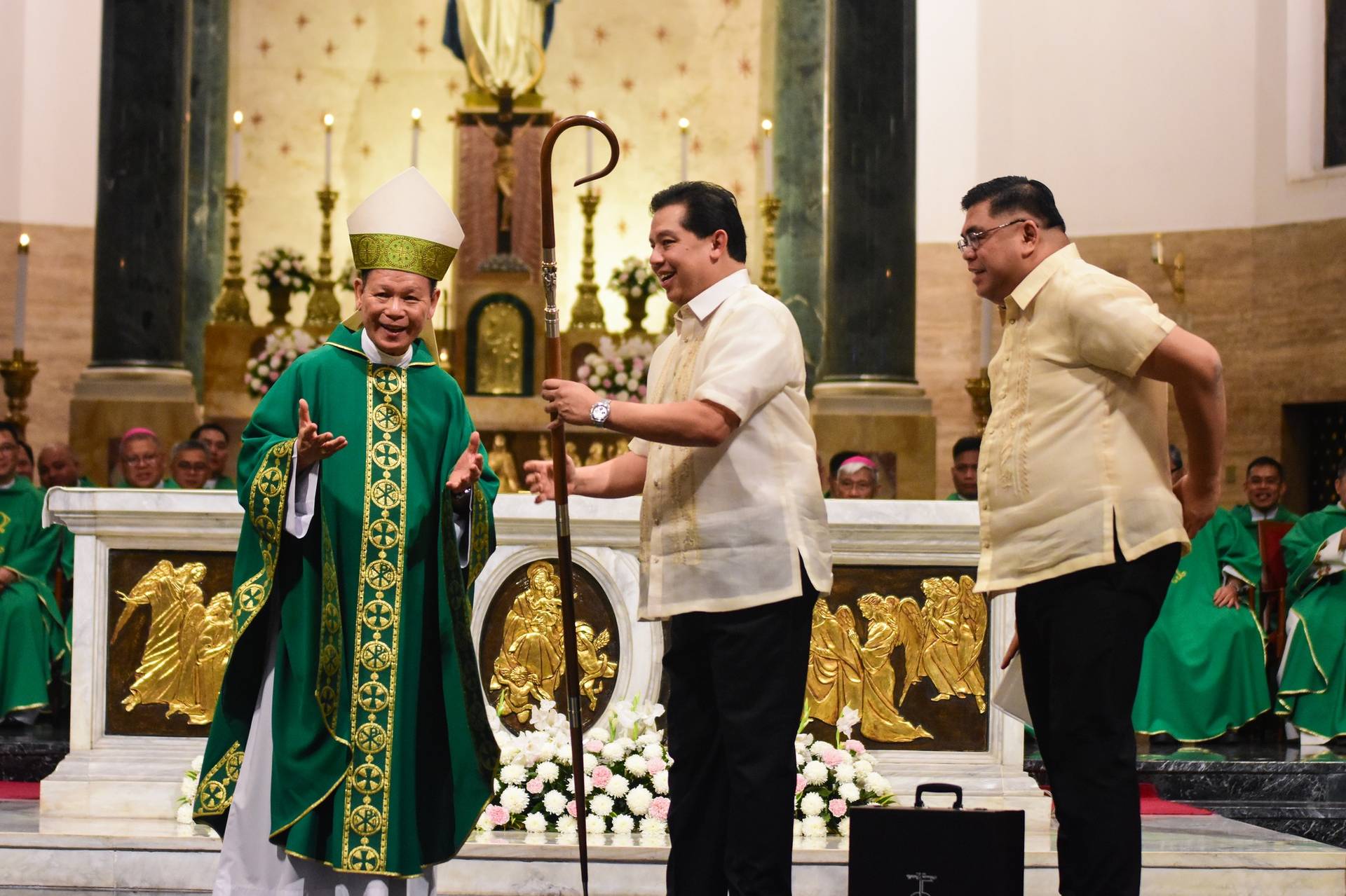 Cardinal Jose Advincula (left) shares a light moment with House Speaker Ferdinand Martin Romualdez (center), cousin of President Ferdinand Romualdez Marcos Jr., during a thanksgiving Mass at the Manila Cathedral, July 27, 2025. (Credit: Manila Cathedral/Facebook.)