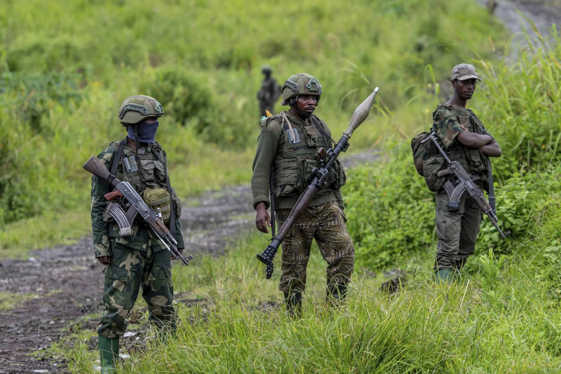 M23 rebels stand with their weapons in Kibumba, in the eastern of Democratic Republic of Congo, Dec. 23, 2022. (Credit: Moses Sawasawa/AP.)