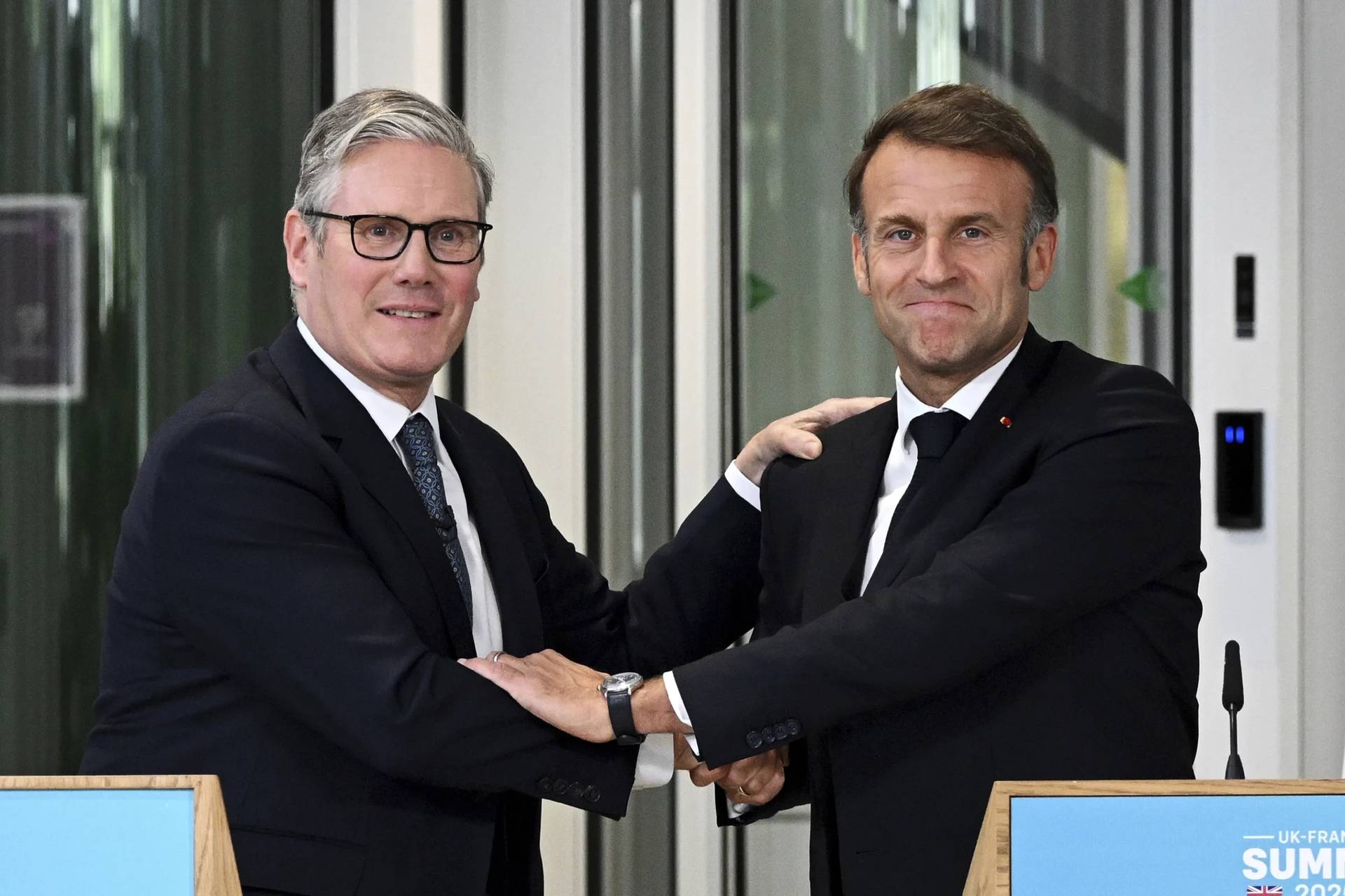 British Prime Minister Keir Starmer, left, and French President Emmanuel Macron hold a joint press conference in London, Thursday July 10, 2025. (Credit: Leon Neal/Pool Photo via AP.)