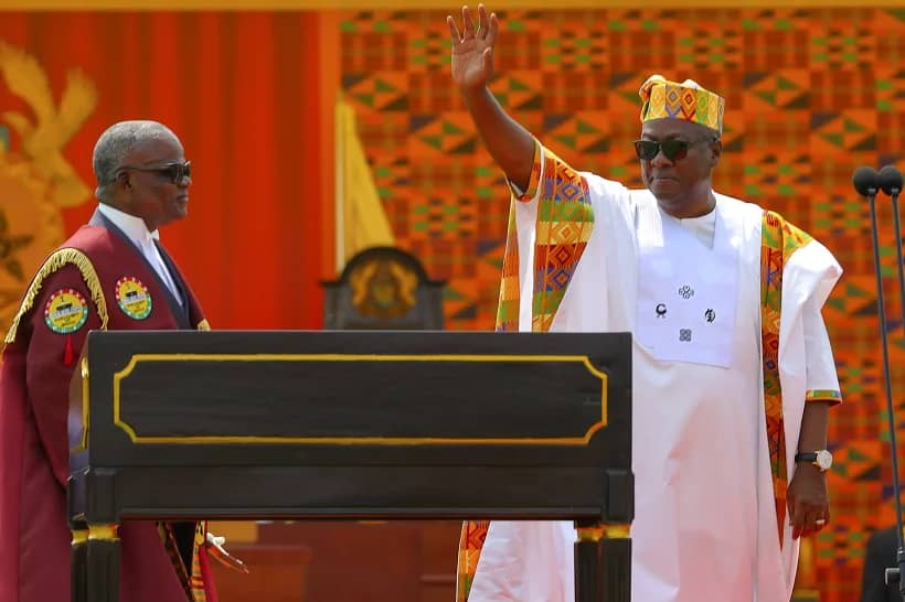 Ghana’s President-Elect John Dramani Mahama, waves after taking the oath of office at his inauguration, at the Independence Square in Accra, Ghana, Jan. 7, 2025. (Credit: Misper Apawu/AP.)