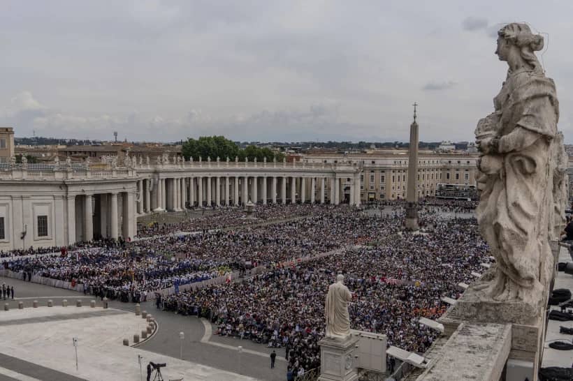 A crowd gathers in St. Peter’s Square at the Vatican, where newly elected Pope Leo XIV will deliver a blessing from the central balcony of St. Peter’s Basilica on Sunday, May 11, 2025. (Credit: Domenico Stinellis/AP.)