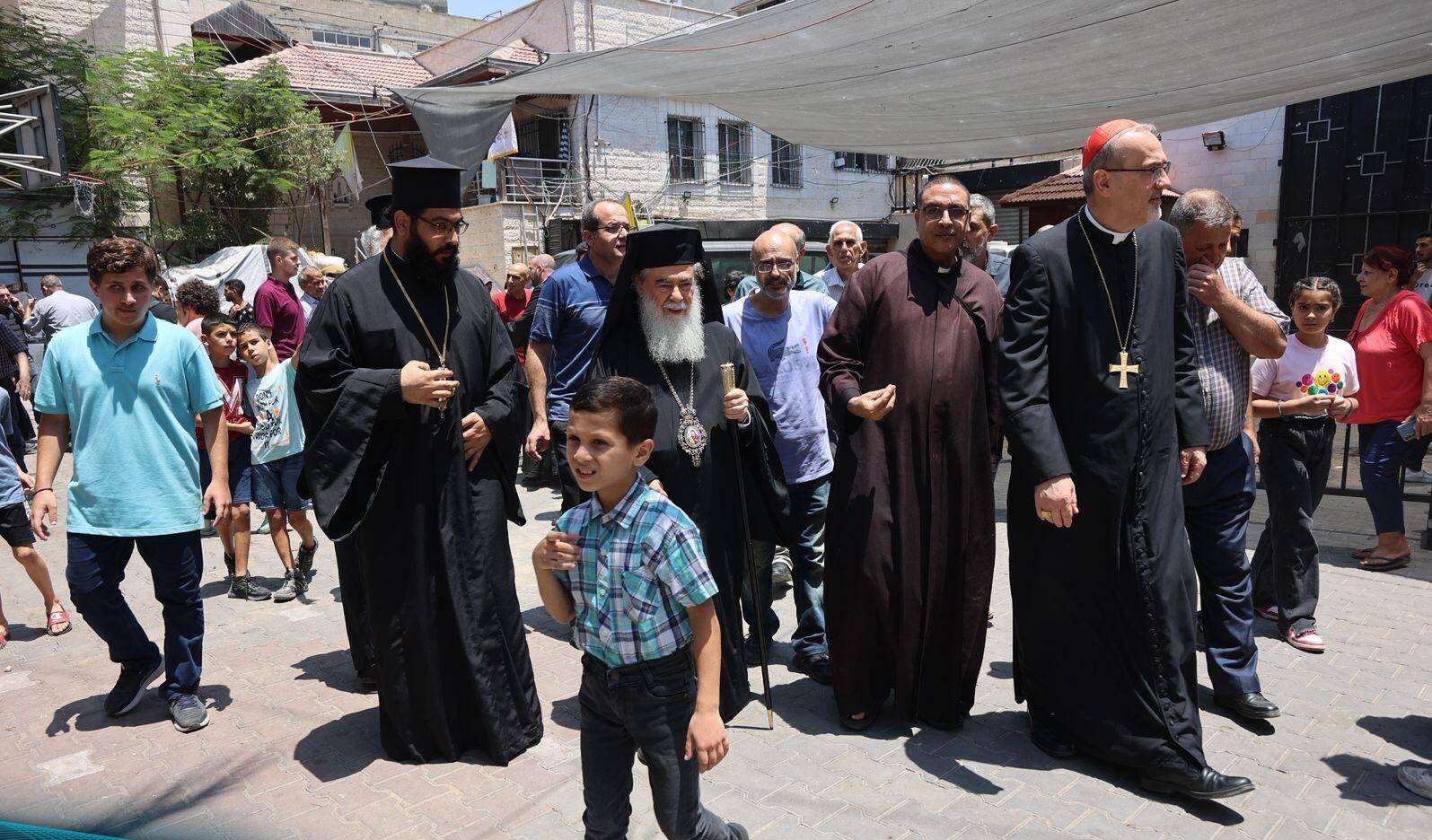 The Latin Patriarch of Jerusalem, Cardinal Pierbattista Pizzaballa, and Patriarch Theophilos III of the Orthodox Church of Jerusalem visit Gaza after Thursday’s attack on the Church of the Holy Family, July 18, 2025. (Credit: Latin Patriarchate of Jerusalem.)