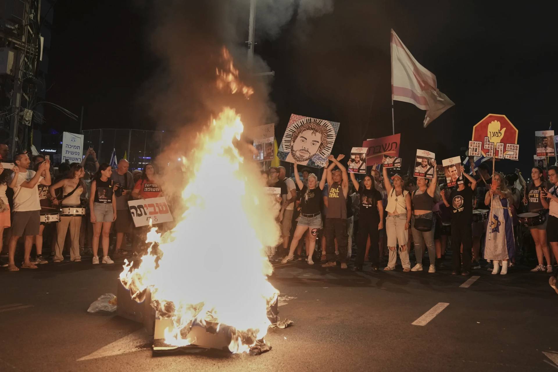 People take part in a protest calling for an end of the war in Gaza in Tel Aviv, Israel, on Aug. 16, 2025. (Credit: Mahmoud Illean/AP.)