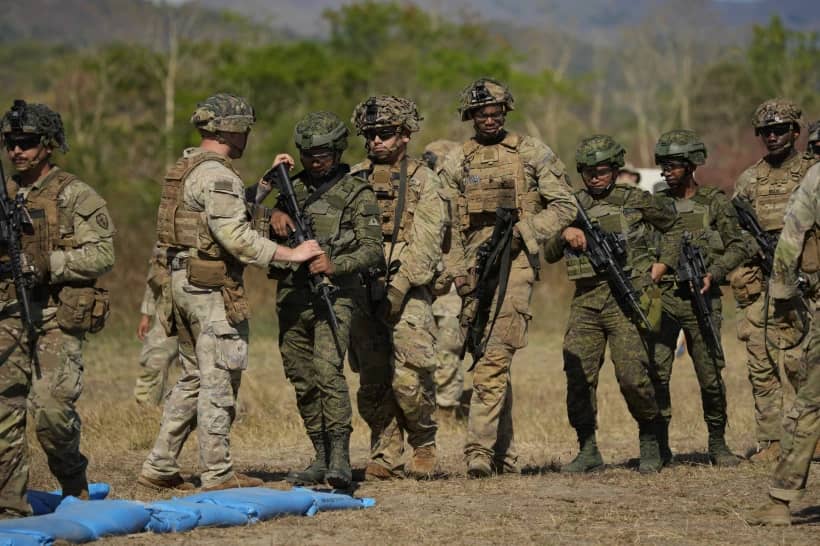 Filipino and U.S. soldiers participate during a joint military drill called Salaknib at Fort Magsaysay, Nueva Ecija province, northern Philippines on March 31, 2023. (Credit: Aaron Favila/AP.)