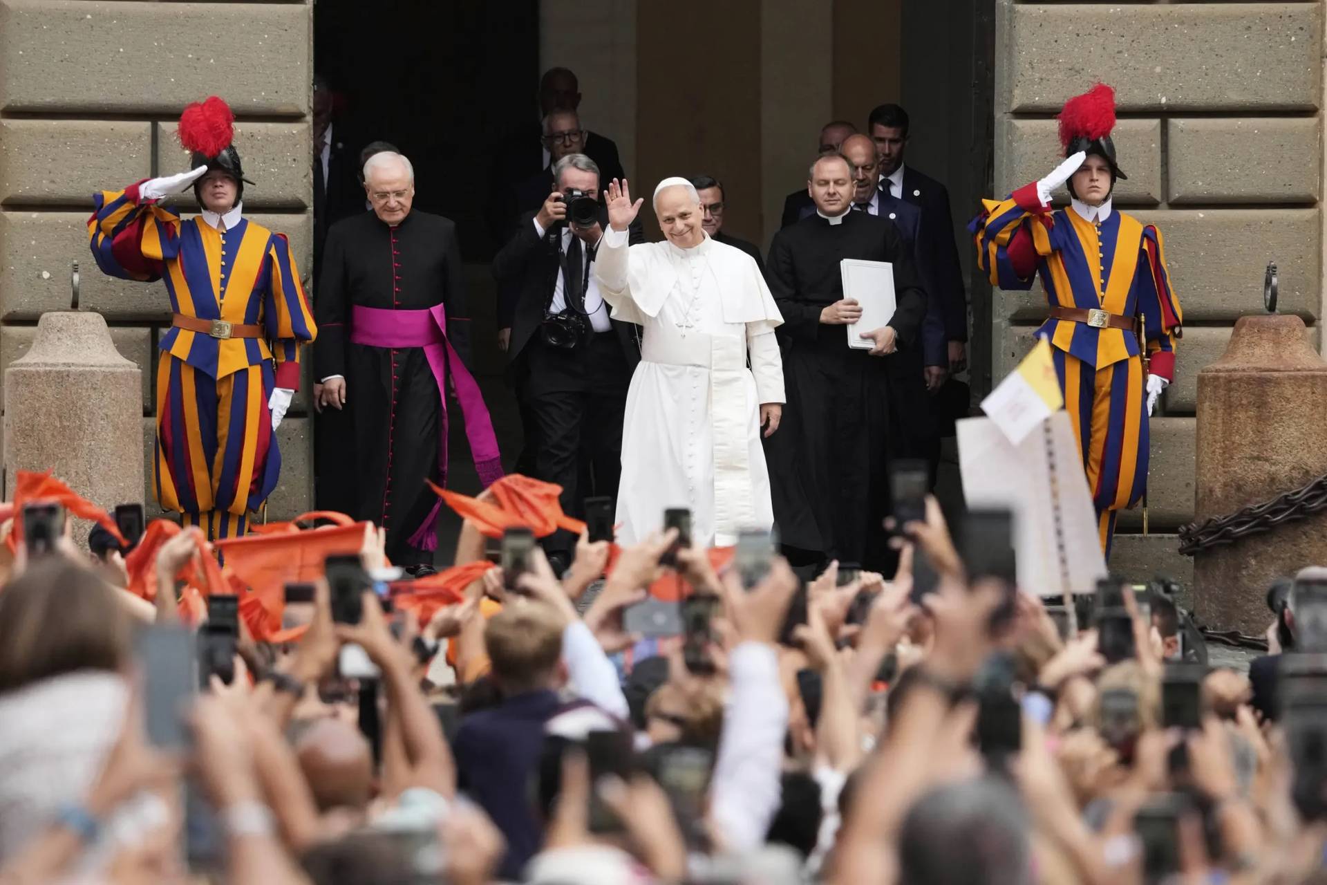 Pope Leo XIV greets meets people outside the St. Thomas of Villanova Church in Castel Gandolfo, Italy, on Aug. 15, 2025. (Credit: Gregorio Borgia/AP.)