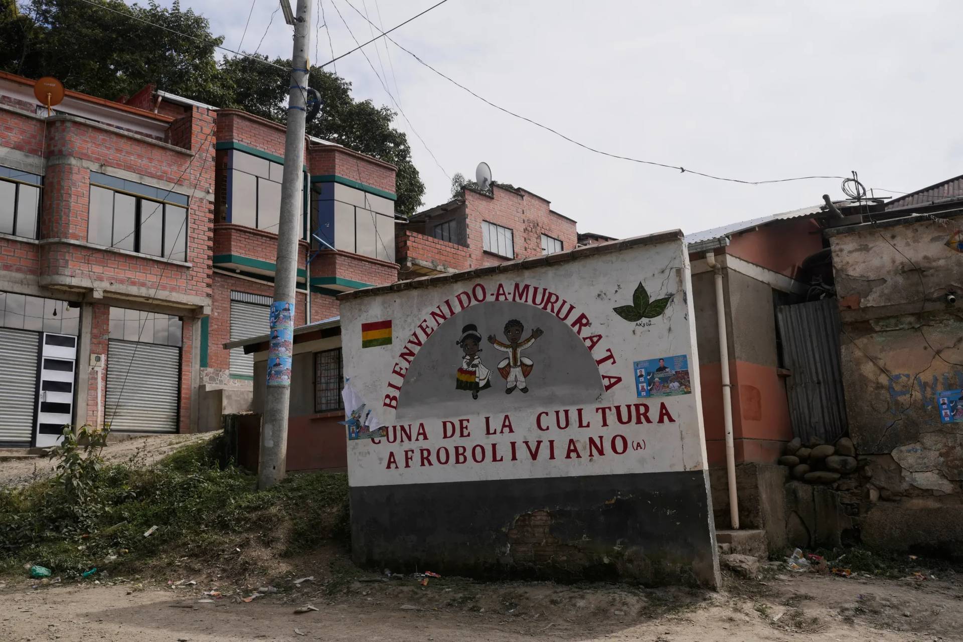 A sign that reads in Spanish: "Welcome to Mururata, cradle of Afro-Bolivian culture" stands in Mururata, Bolivia, on Aug. 3, 2025. (Credit: Juan Karita/AP.)